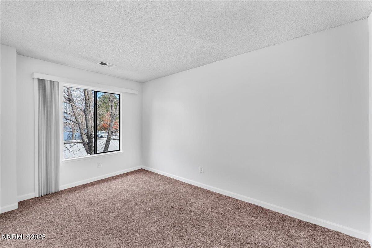 3230 Wedekind Road, Unit 64 Sparks, NV 89431 - Photo 16 of 28 an empty room with windows