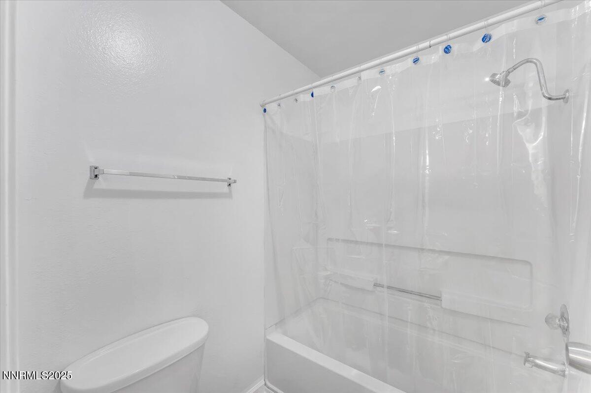 3230 Wedekind Road, Unit 64 Sparks, NV 89431 - Photo 18 of 28 a bathroom with a shower and a toilet