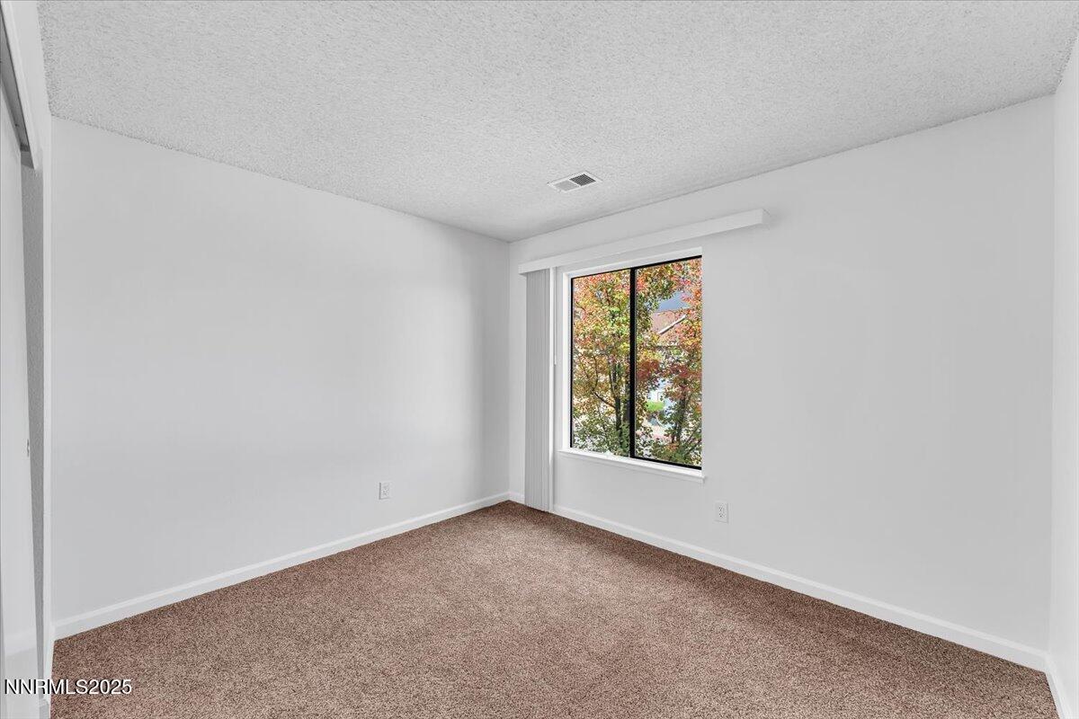 3230 Wedekind Road, Unit 64 Sparks, NV 89431 - Photo 20 of 28 an empty room with windows