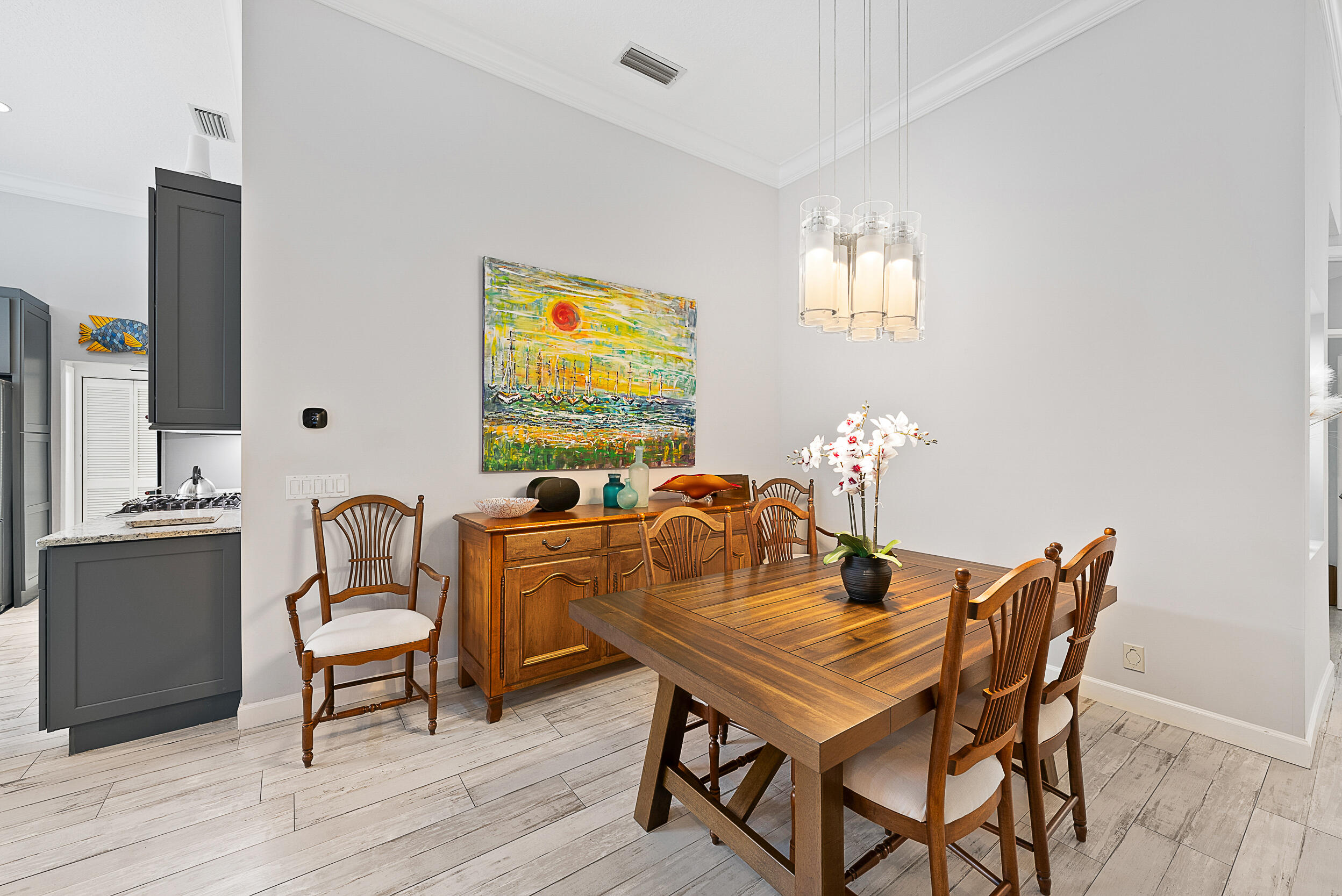 271 Eagleton Estates Boulevard Palm Beach Gardens, FL 33418 - Photo 11 of 37 a dining room with furniture and window