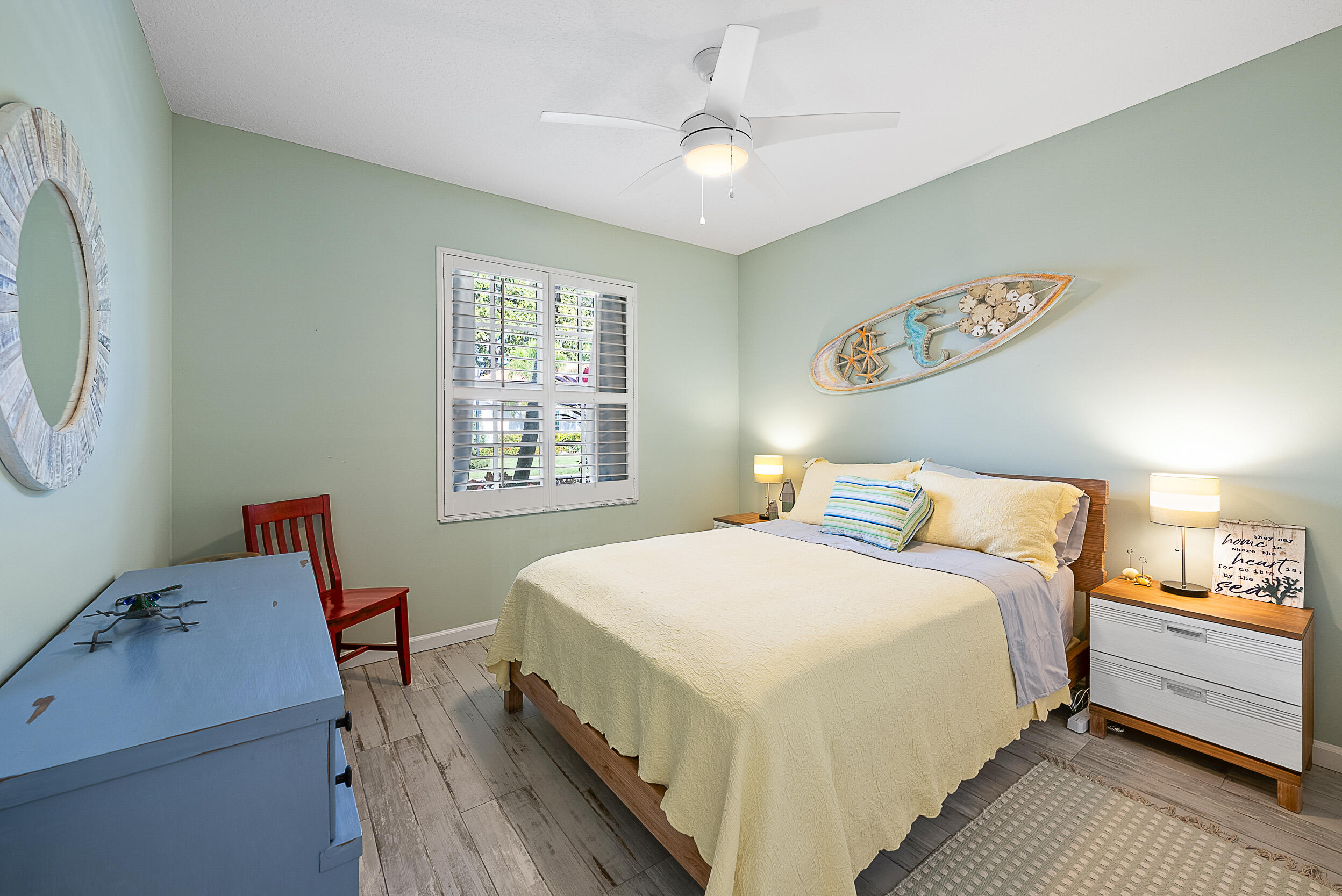 271 Eagleton Estates Boulevard Palm Beach Gardens, FL 33418 - Photo 19 of 37 a bedroom with a bed and a window