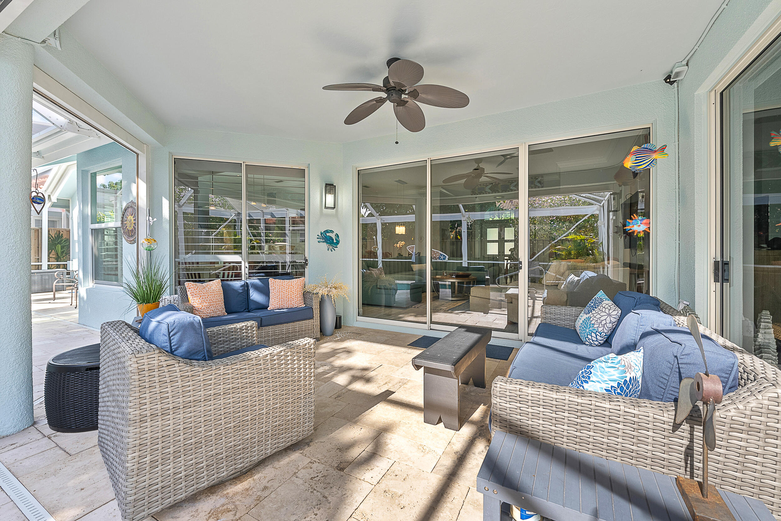 271 Eagleton Estates Boulevard Palm Beach Gardens, FL 33418 - Photo 25 of 37 a living room with furniture and a large window