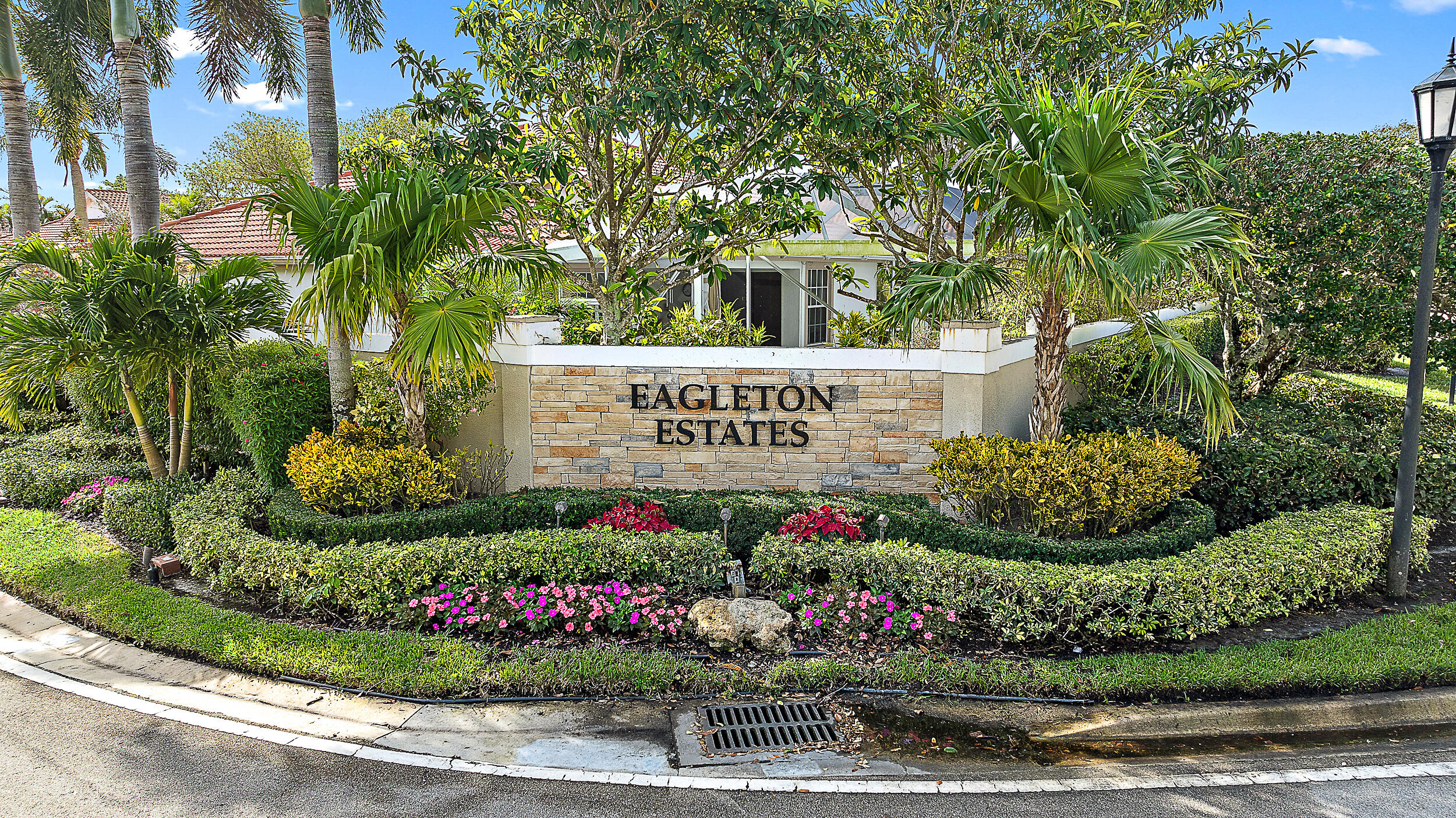 271 Eagleton Estates Boulevard Palm Beach Gardens, FL 33418 - Photo 30 of 37 a view of sign board and garden