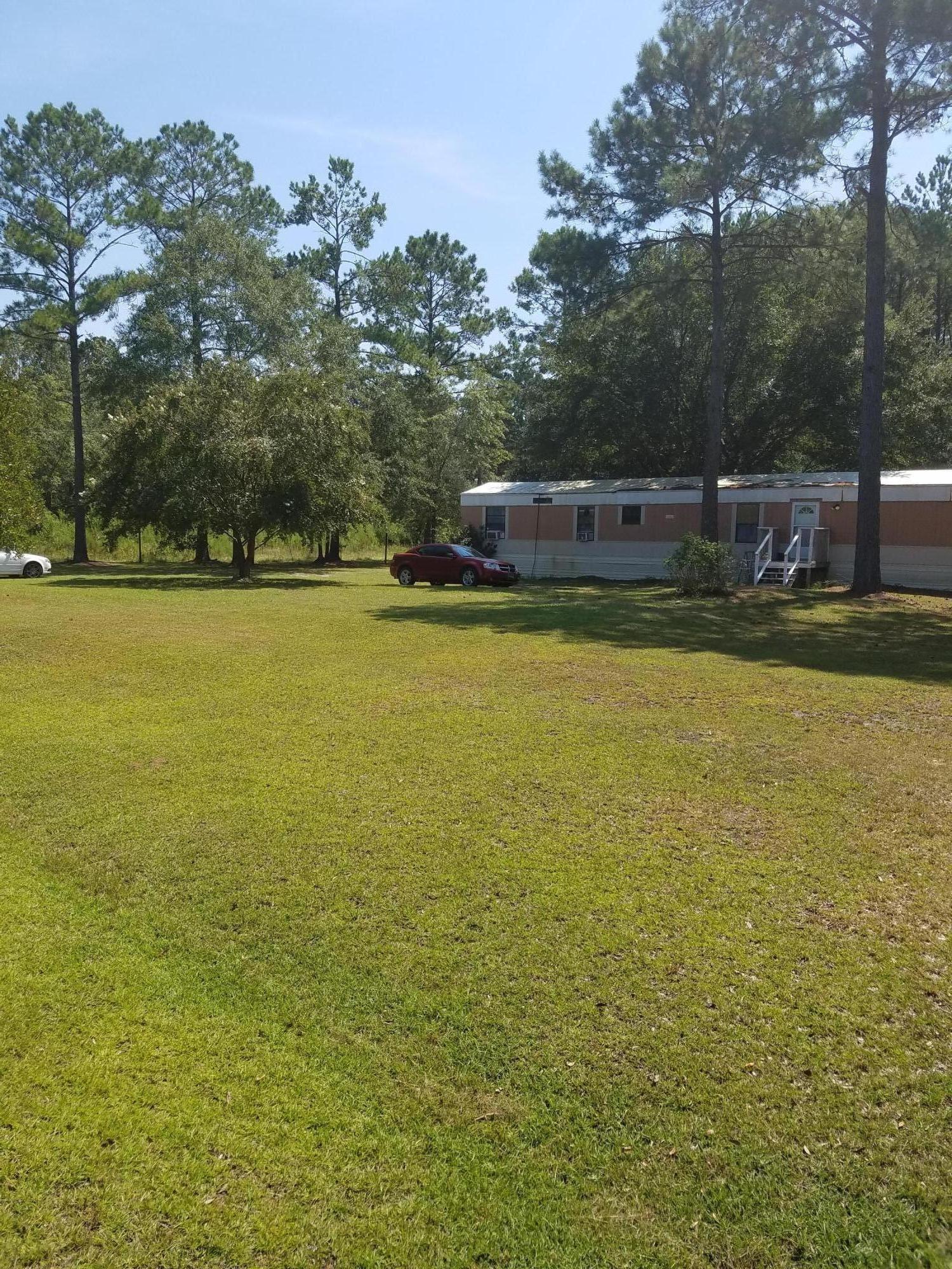 6953 Buckhorn Road Ravenel, SC 29470 - Photo 1 of 3 6953 Buckhorn 1