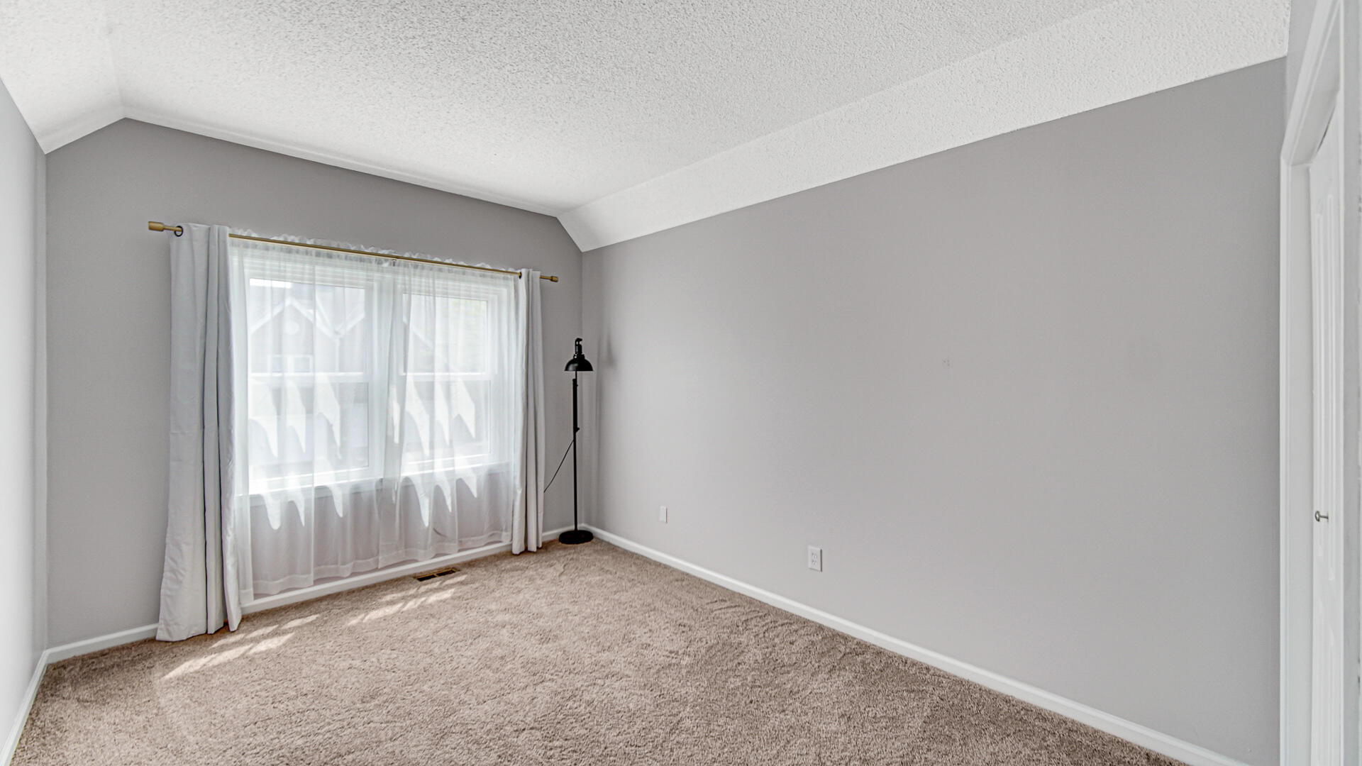 771 Kenmare Parkway Crown Point, IN 46307 - Photo 17 of 20 an empty room with windows