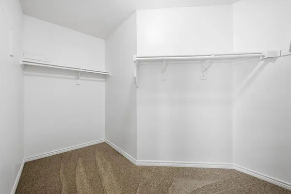 a bathroom with a granite countertop sink mirror and double