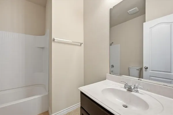 a view of storage and utility room with empty racks
