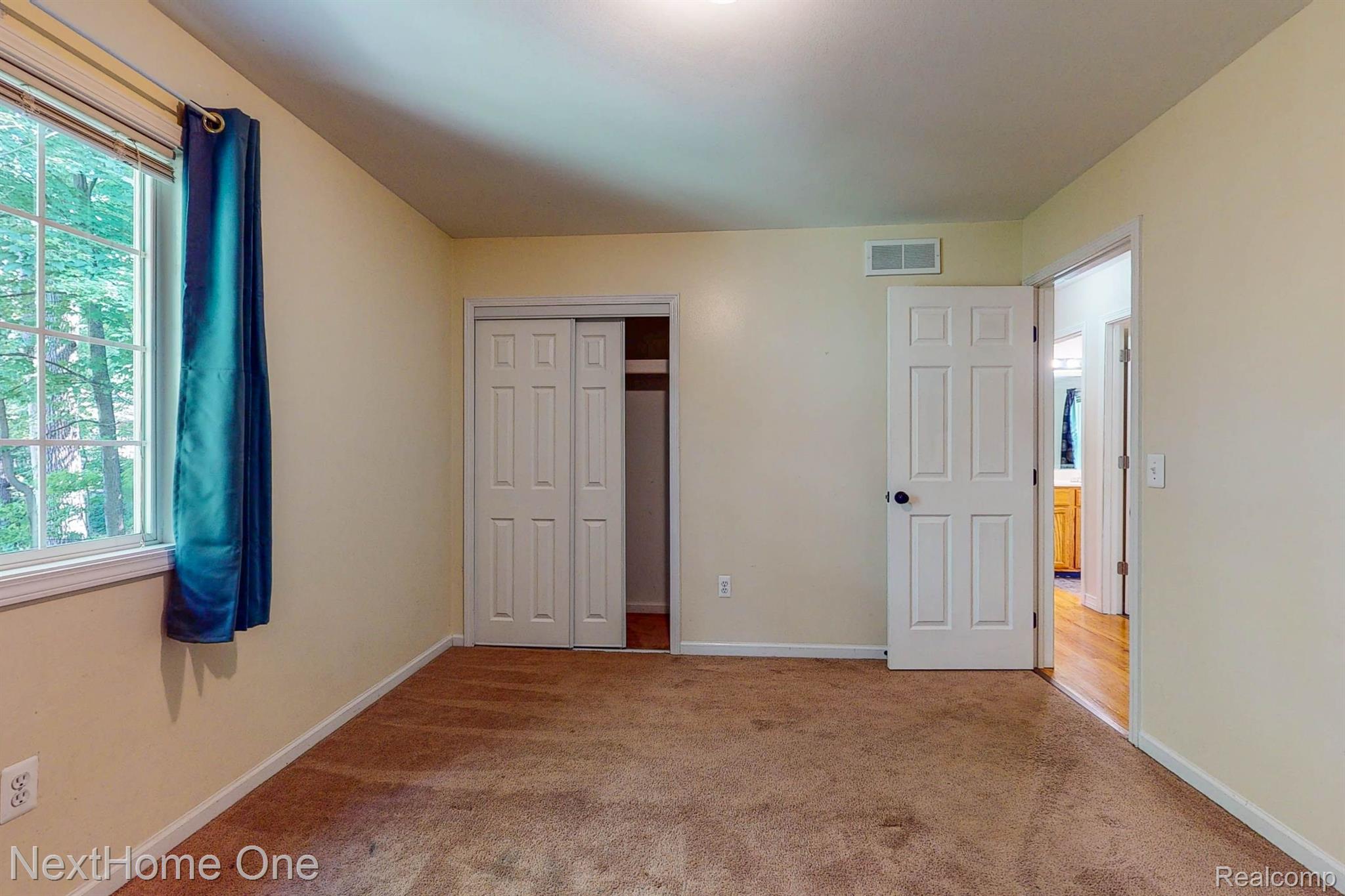 4619 Culver Road Brighton, MI 48114 - Photo 21 of 33 bedroom 2 view toward hall