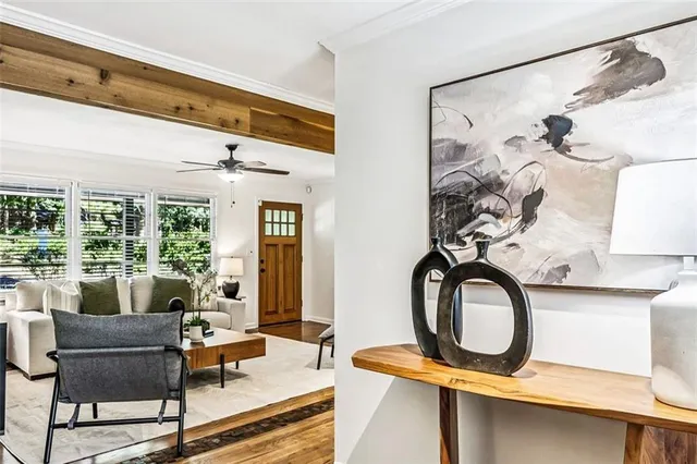 a living room with furniture and a window