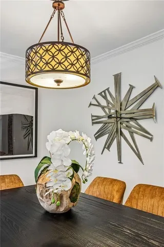 a view of a dining room and a table