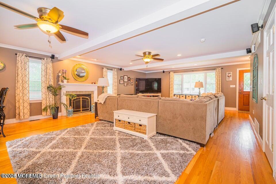 1 Kari Court Jackson, NJ 08527 - Photo 16 of 66 a living room with fireplace furniture and a flat screen tv
