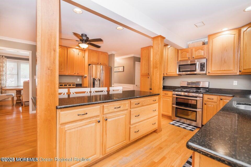 1 Kari Court Jackson, NJ 08527 - Photo 23 of 66 a kitchen with granite countertop a stove a sink and a refrigerator