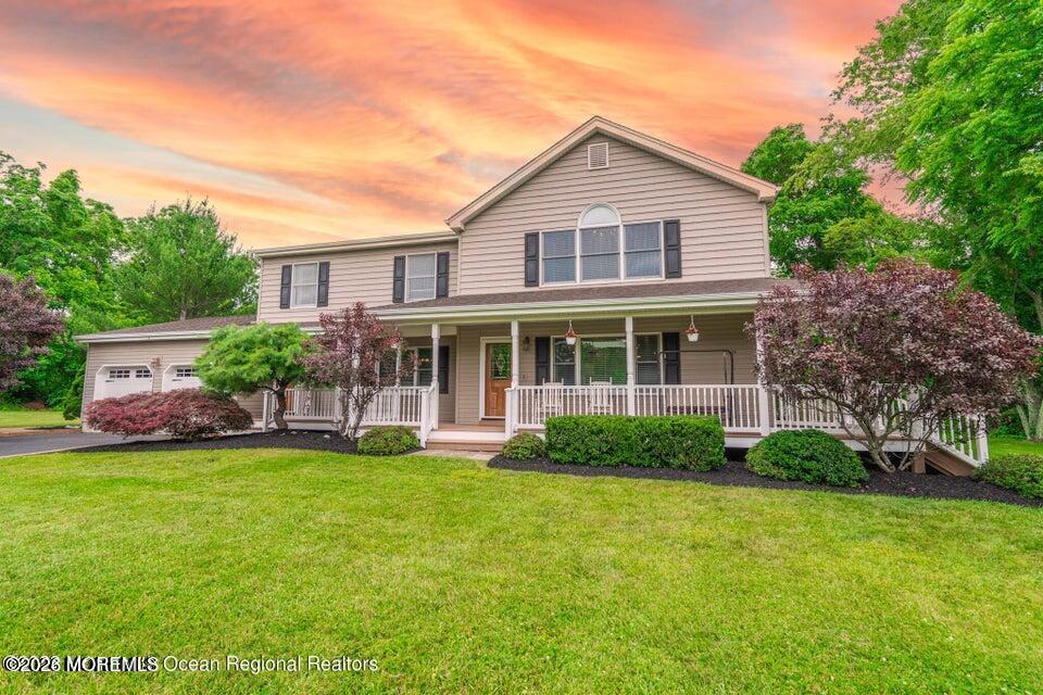 1 Kari Court Jackson, NJ 08527 - Photo 3 of 66 a front view of a house with a yard and potted plants