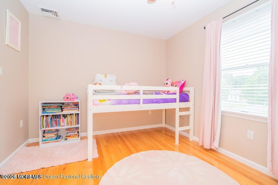 1 Kari Court Jackson, NJ 08527 - Photo 38 of 66 a workspace with furniture and a book shelf