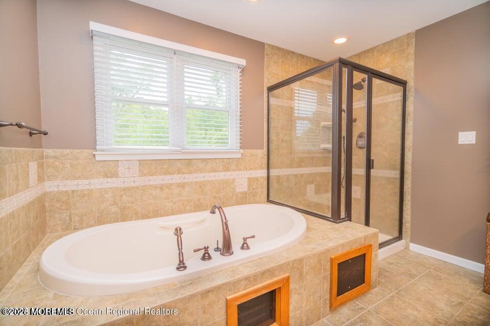 1 Kari Court Jackson, NJ 08527 - Photo 51 of 66 a bath tub sitting next to a window
