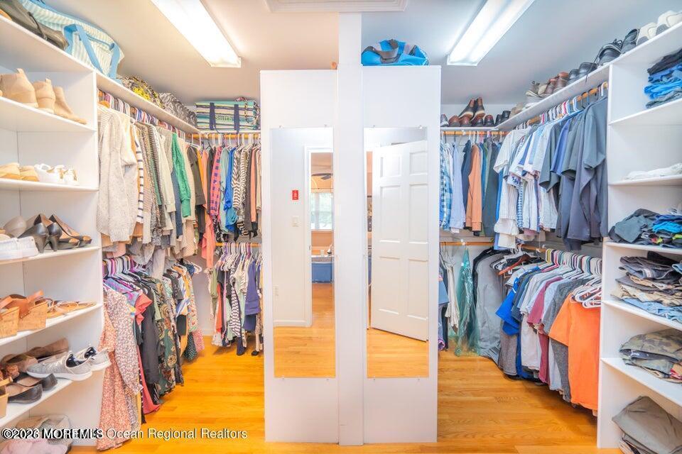 1 Kari Court Jackson, NJ 08527 - Photo 52 of 66 a view of walk in closet with clothes and shoes