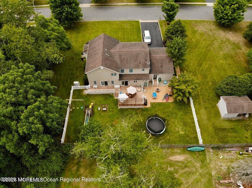 1 Kari Court Jackson, NJ 08527 - Photo 59 of 66 an aerial view of a house with swimming pool and large trees