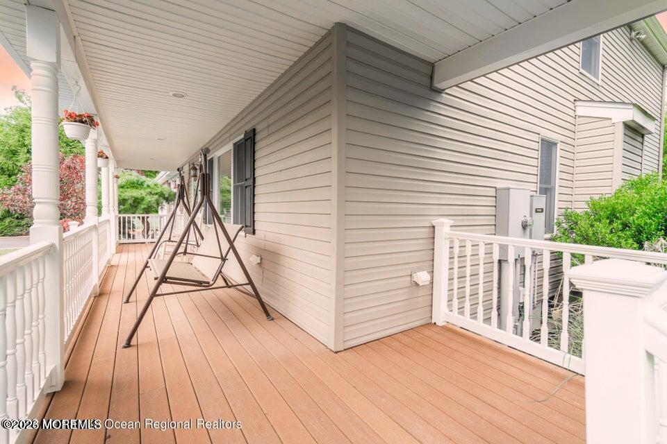 1 Kari Court Jackson, NJ 08527 - Photo 6 of 66 a view of a balcony with wooden floor and fence