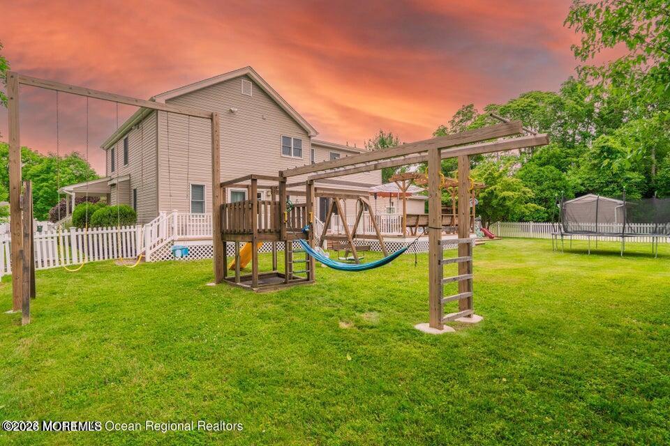 1 Kari Court Jackson, NJ 08527 - Photo 65 of 66 a view of a house with a yard and a slide