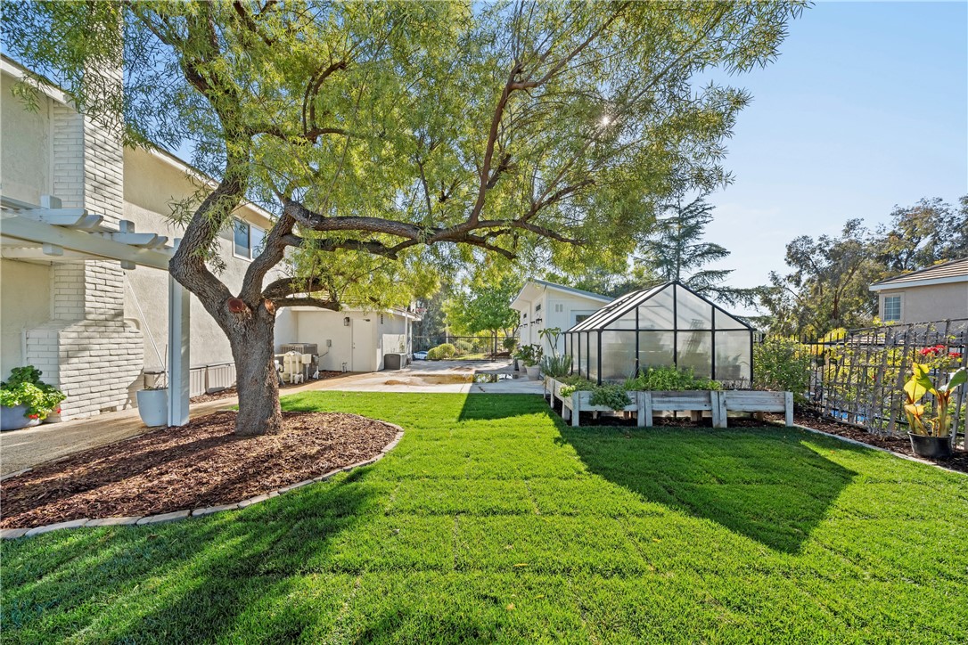6607 New Ridge Drive Riverside, CA 92506 - Photo 41 of 46 a view of a house with a yard