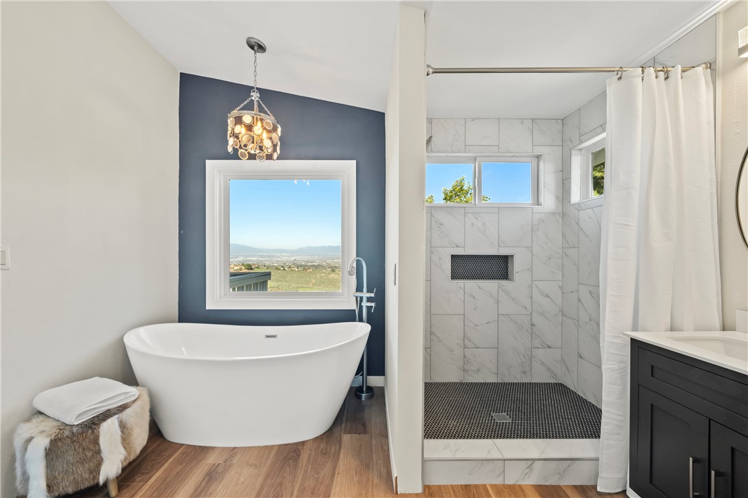 6607 New Ridge Drive Riverside, CA 92506 - Photo 44 of 46 a bathroom with a toilet and a shower