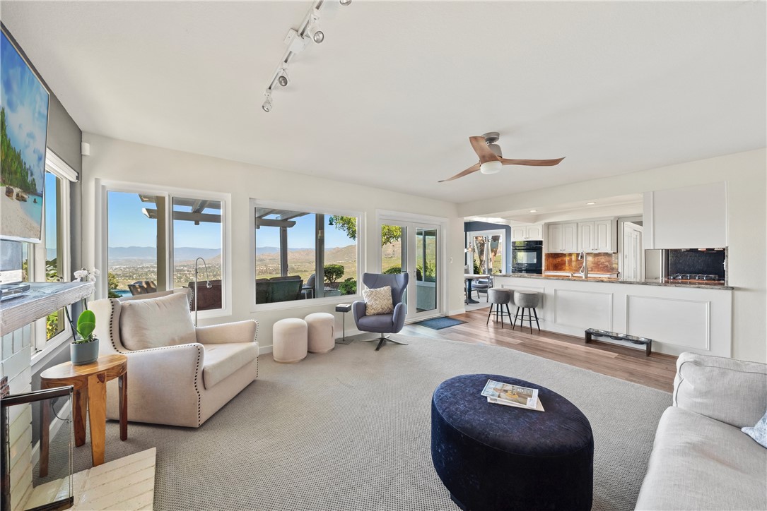 6607 New Ridge Drive Riverside, CA 92506 - Photo 7 of 46 a living room with furniture and a large window