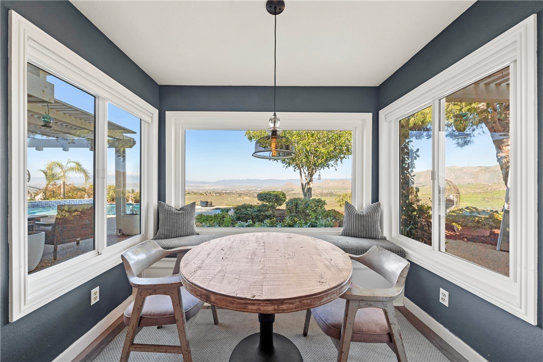 6607 New Ridge Drive Riverside, CA 92506 - Photo 10 of 46 a view of a dining room with furniture window and outside view