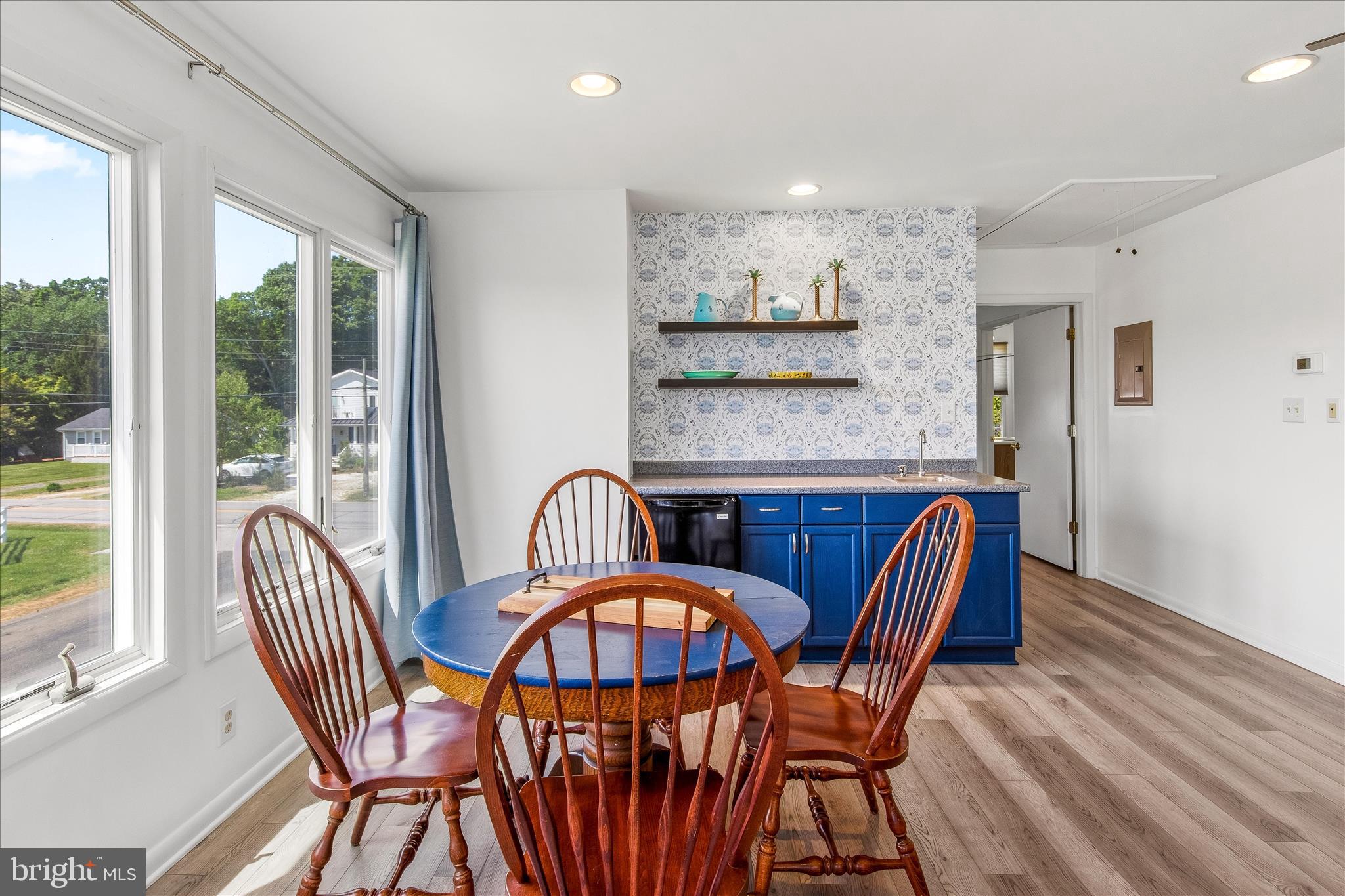 21406 Dogwood Cove Road Tilghman, MD 21671 - Photo 54 of 68 a view of a dining room with furniture window and outside view