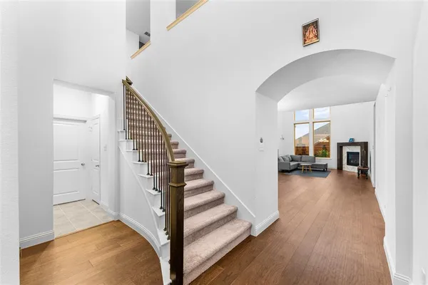 a view of a hallway view with staircase