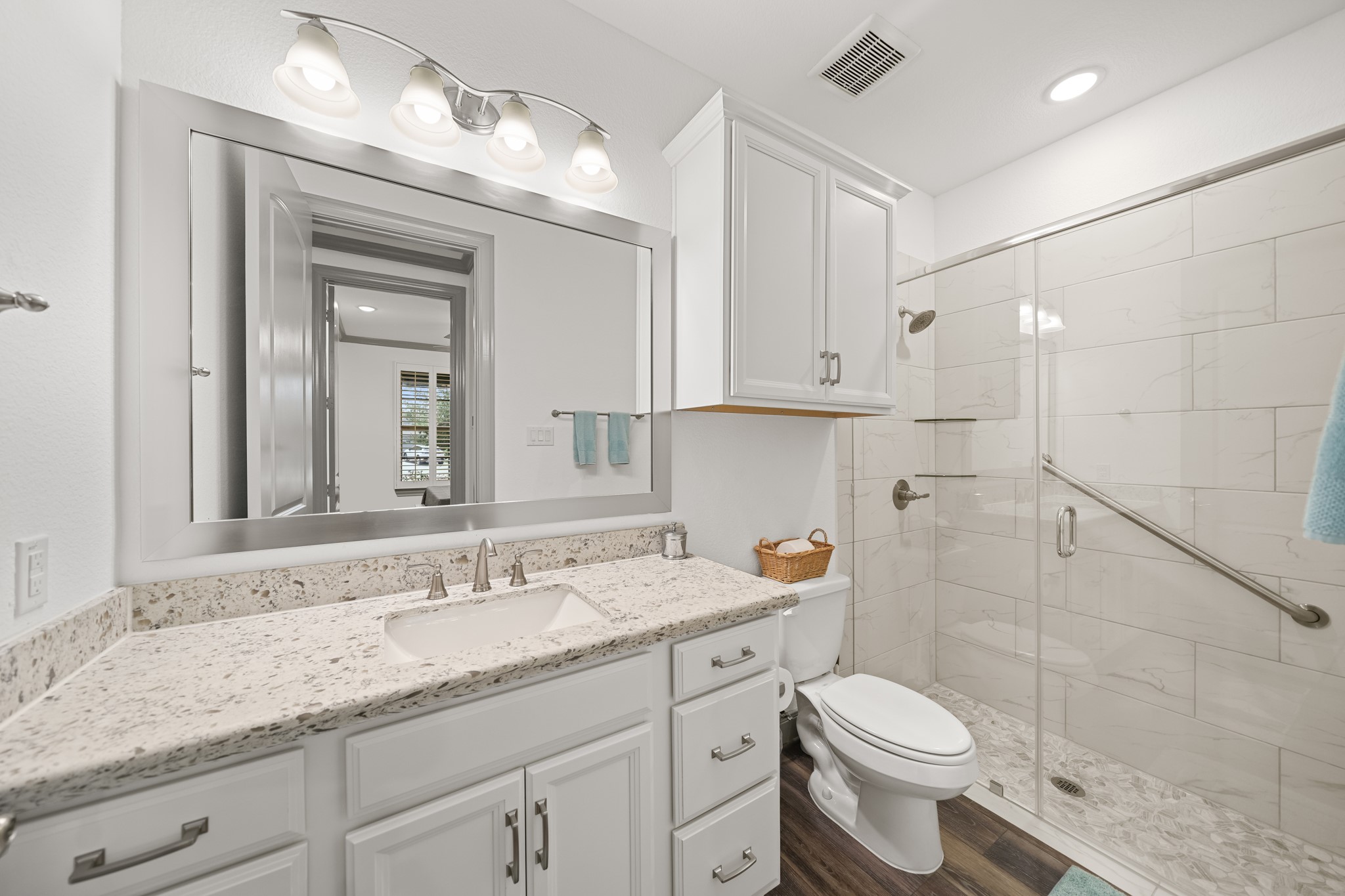 5739 Bobwhite Trail Manvel, TX 77578 - Photo 21 of 29 Beautiful finishes continue into the secondary bath with granite countertops and a fully tiled walk-in shower. The clean, timeless design offers both elegance and practicality.