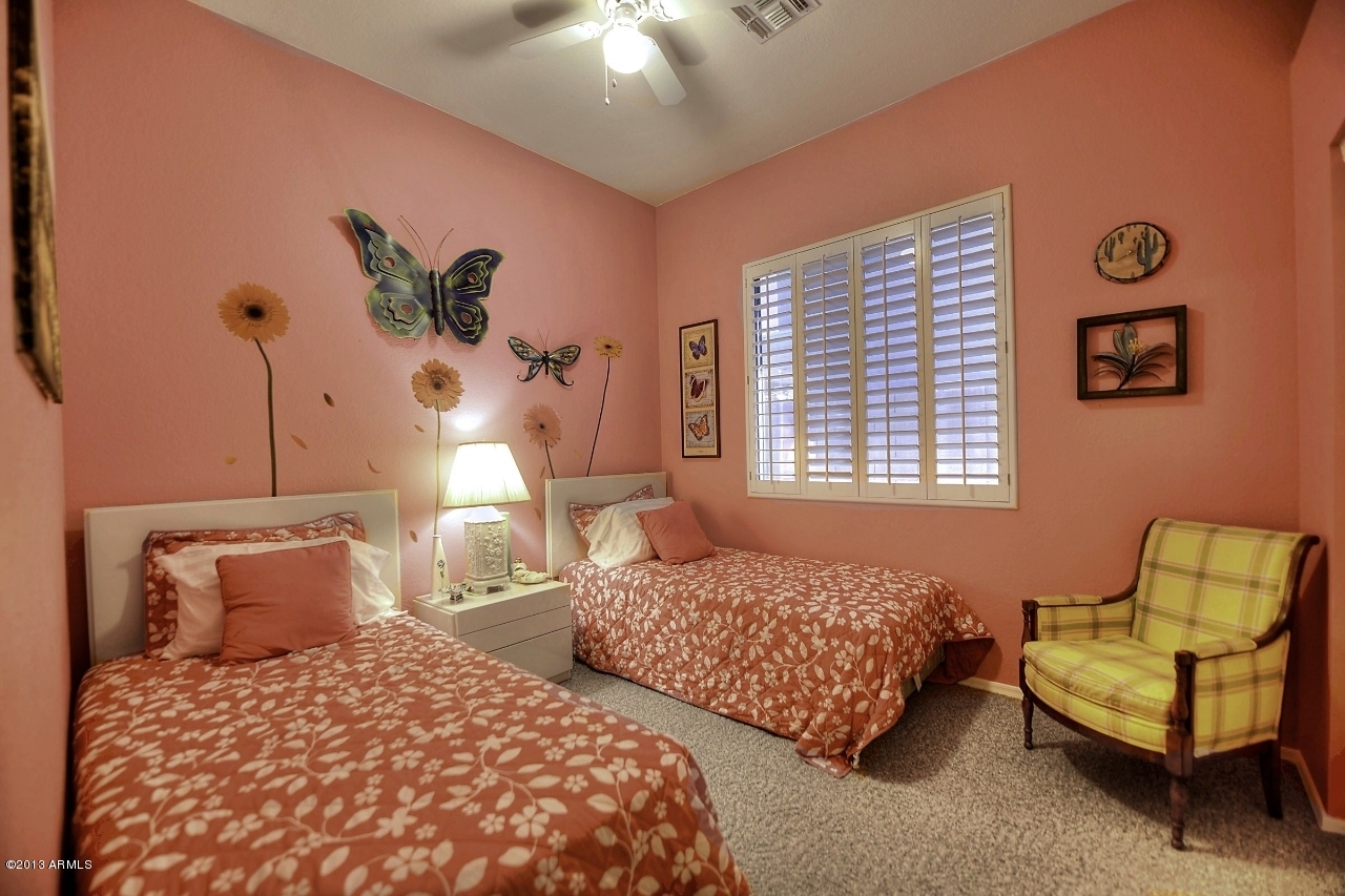 4243 East Tether Trail Phoenix, AZ 85050 - Photo 22 of 28 a bedroom with two beds and potted plant