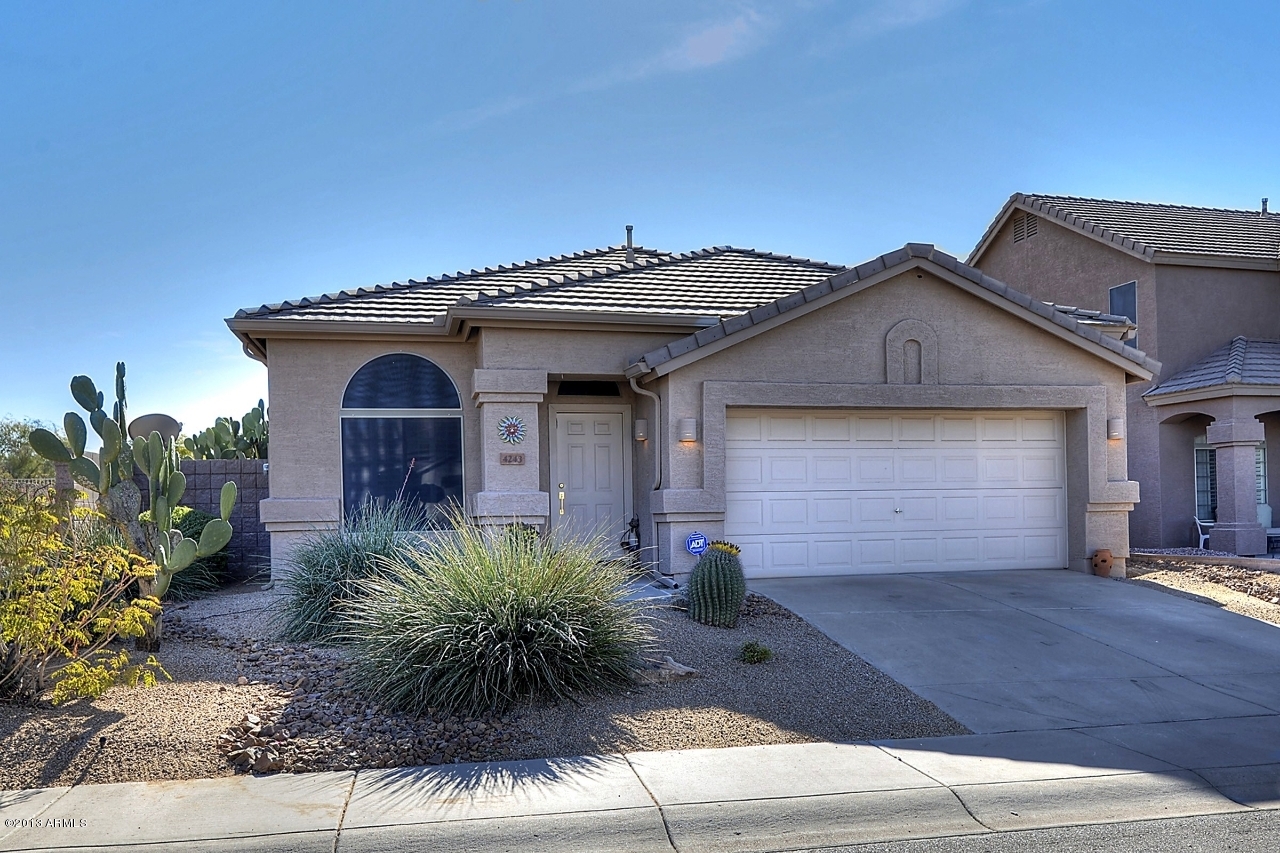 4243 East Tether Trail Phoenix, AZ 85050 - Photo 7 of 28 a front view of a house with yard