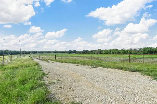a view of a lake with a big yard