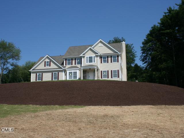 4 Rooster Ridge Road Newtown, CT 06470 - Photo 1 of 1 a front view of a house with a yard