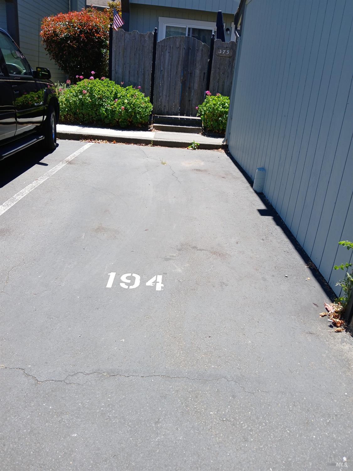 381 Wall Place Santa Rosa, CA 95401 - Photo 18 of 18 a view of a street with a bench in front of house