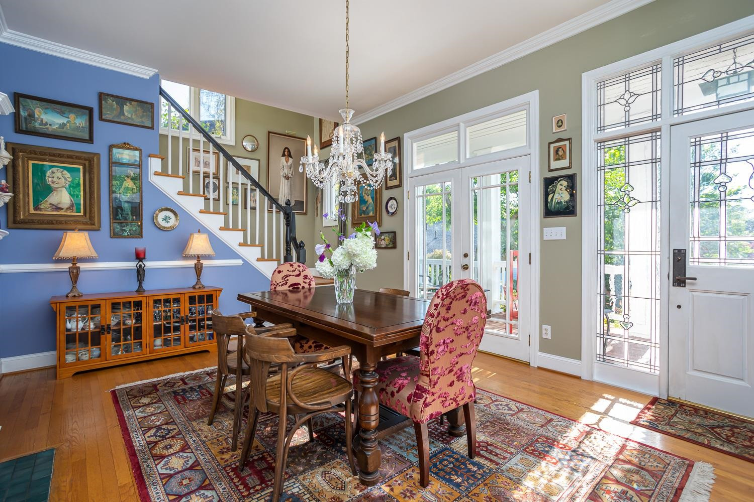 601 Leonidas Court Raleigh, NC 27604 - Photo 15 of 53 the dining room has an antique mantelpiece, chandelier with aurora borealis crystals, projecting colorful rainbows around the room Dining Room