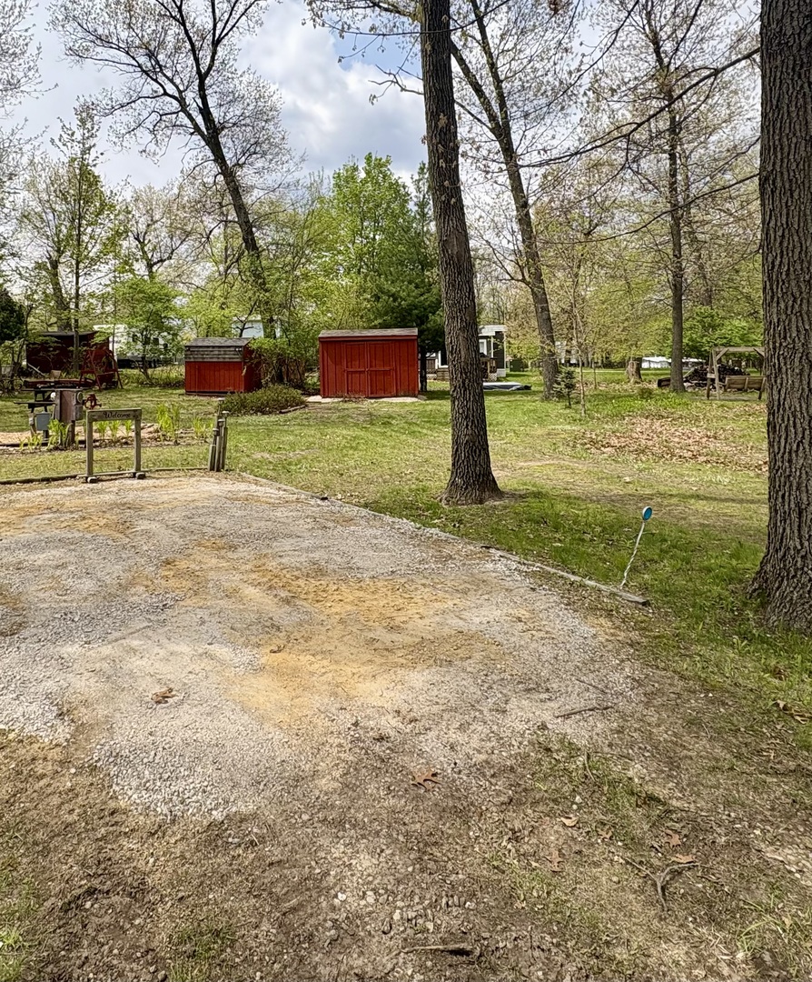 8-50&51 Woodhaven Sublette, IL 61367 - Photo 2 of 5 a view of a park with large trees