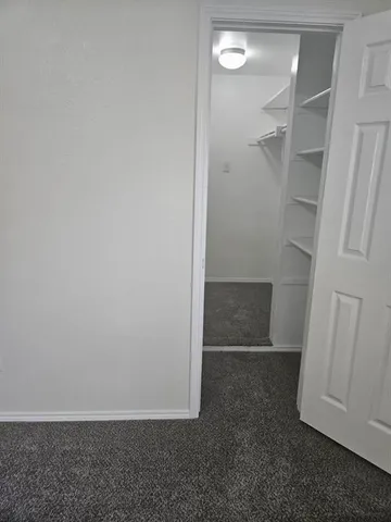 an empty room with closet