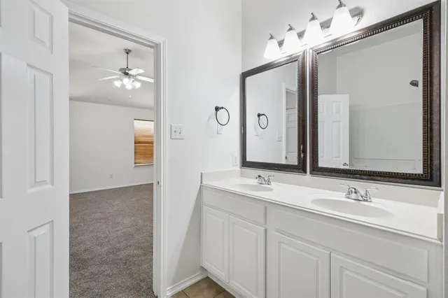 an empty room with fan