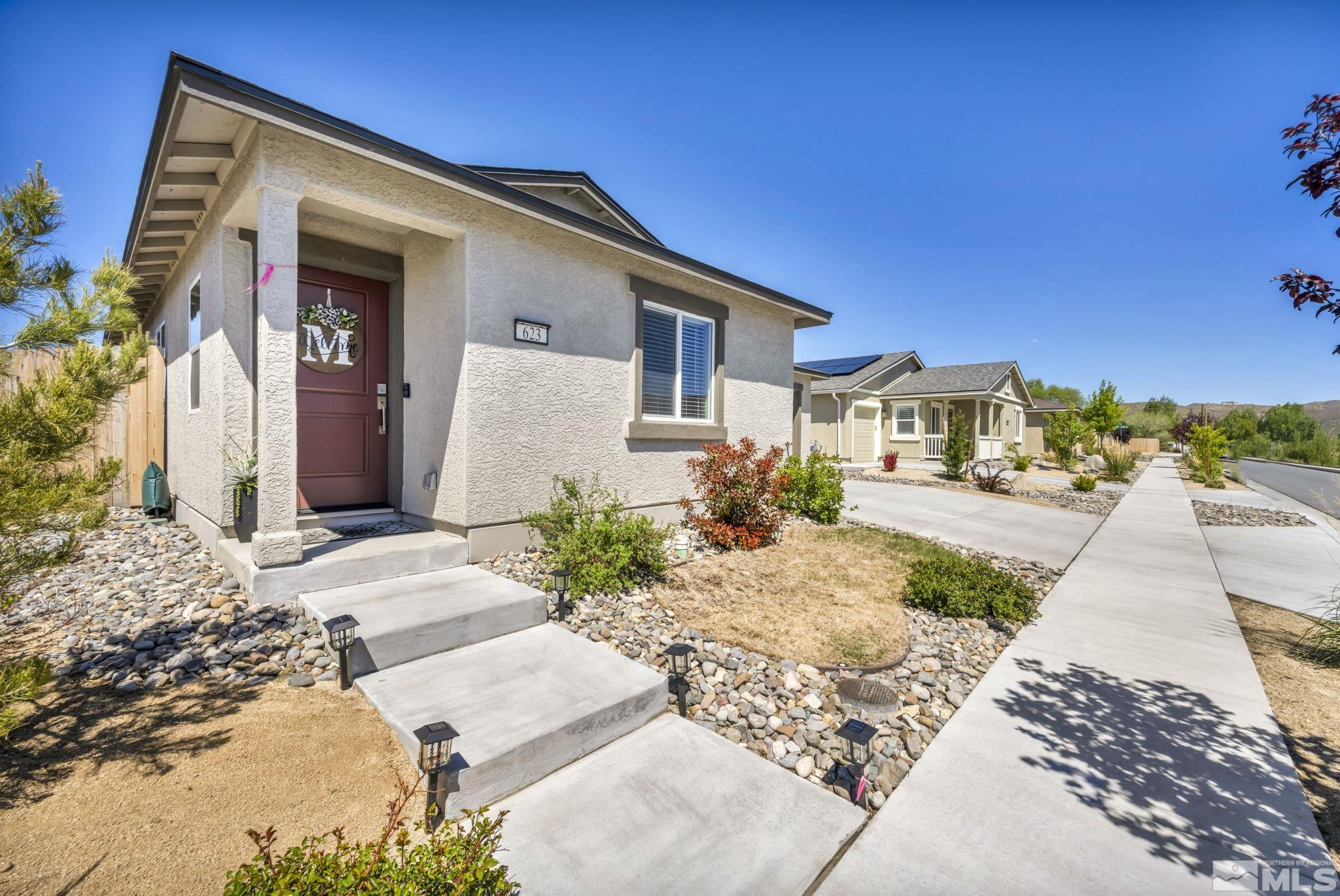 623 Yerington Drive Reno, NV 89506 - Photo 14 of 40 a front view of a house with a yard