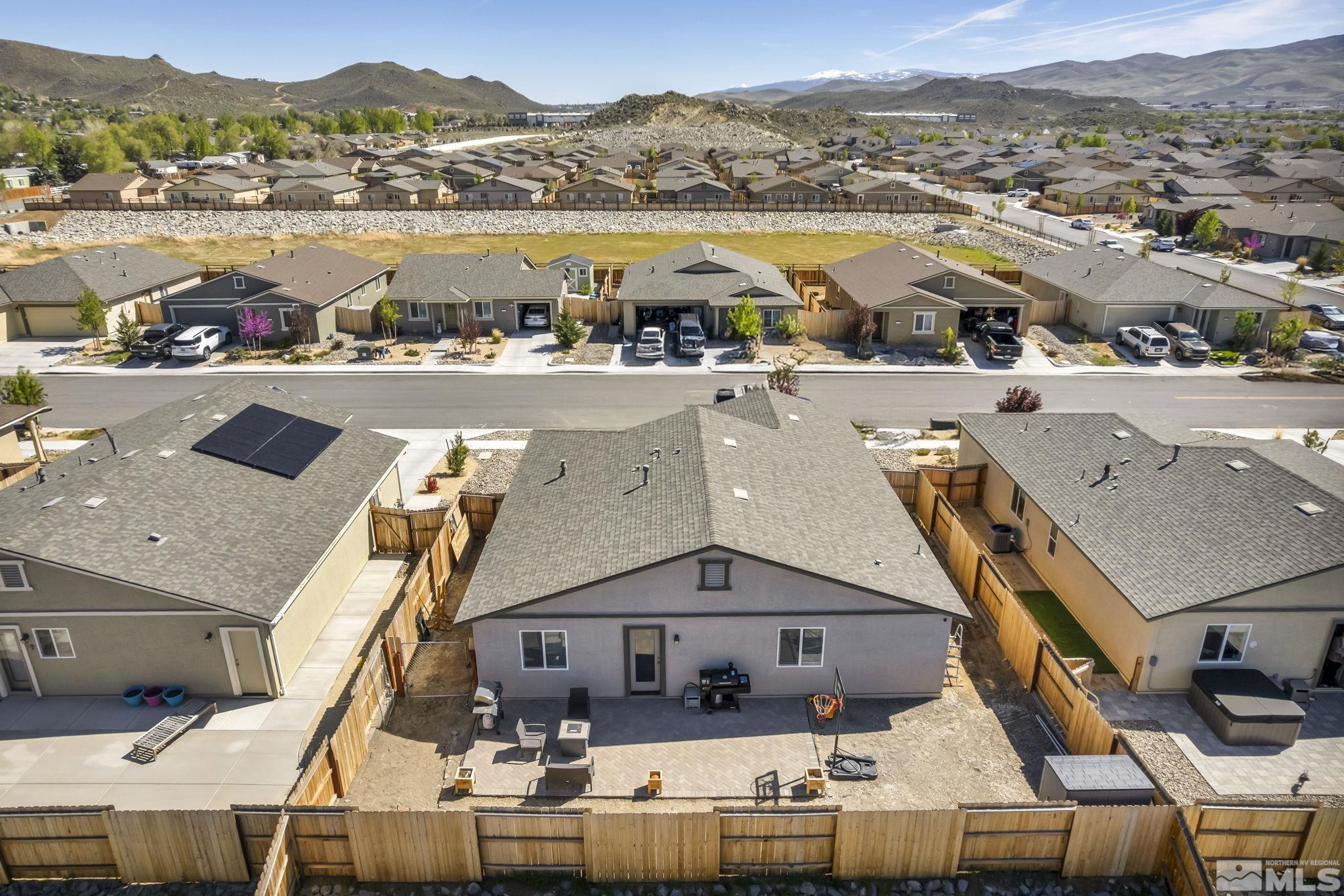 623 Yerington Drive Reno, NV 89506 - Photo 22 of 40 an aerial view of residential houses with outdoor space