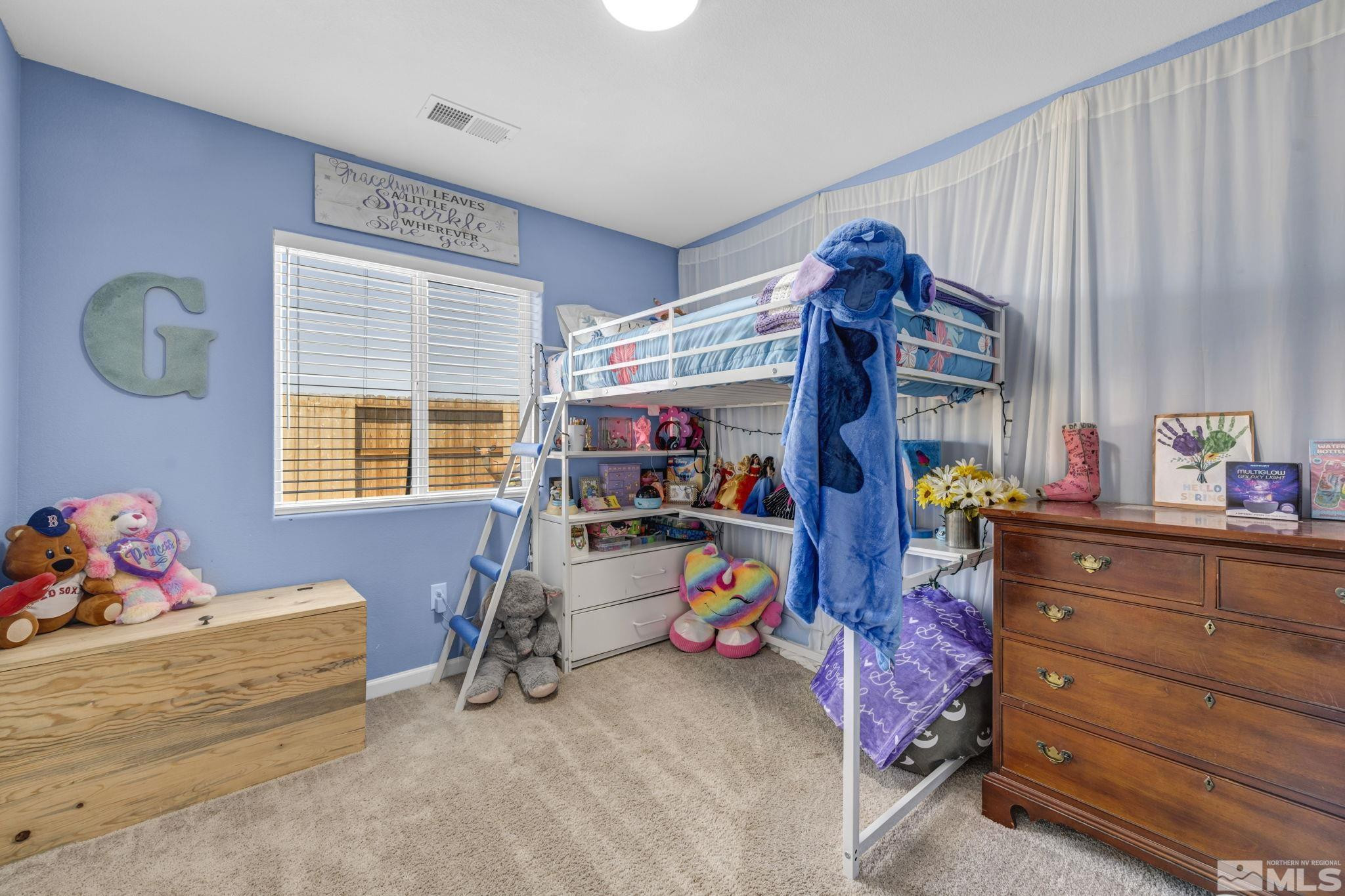623 Yerington Drive Reno, NV 89506 - Photo 25 of 40 a bed room with furniture and a window