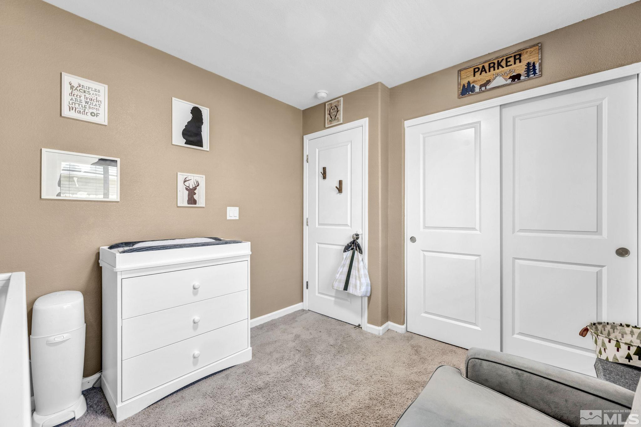 623 Yerington Drive Reno, NV 89506 - Photo 29 of 40 a view of a bedroom with cabinet cabinet and mirror