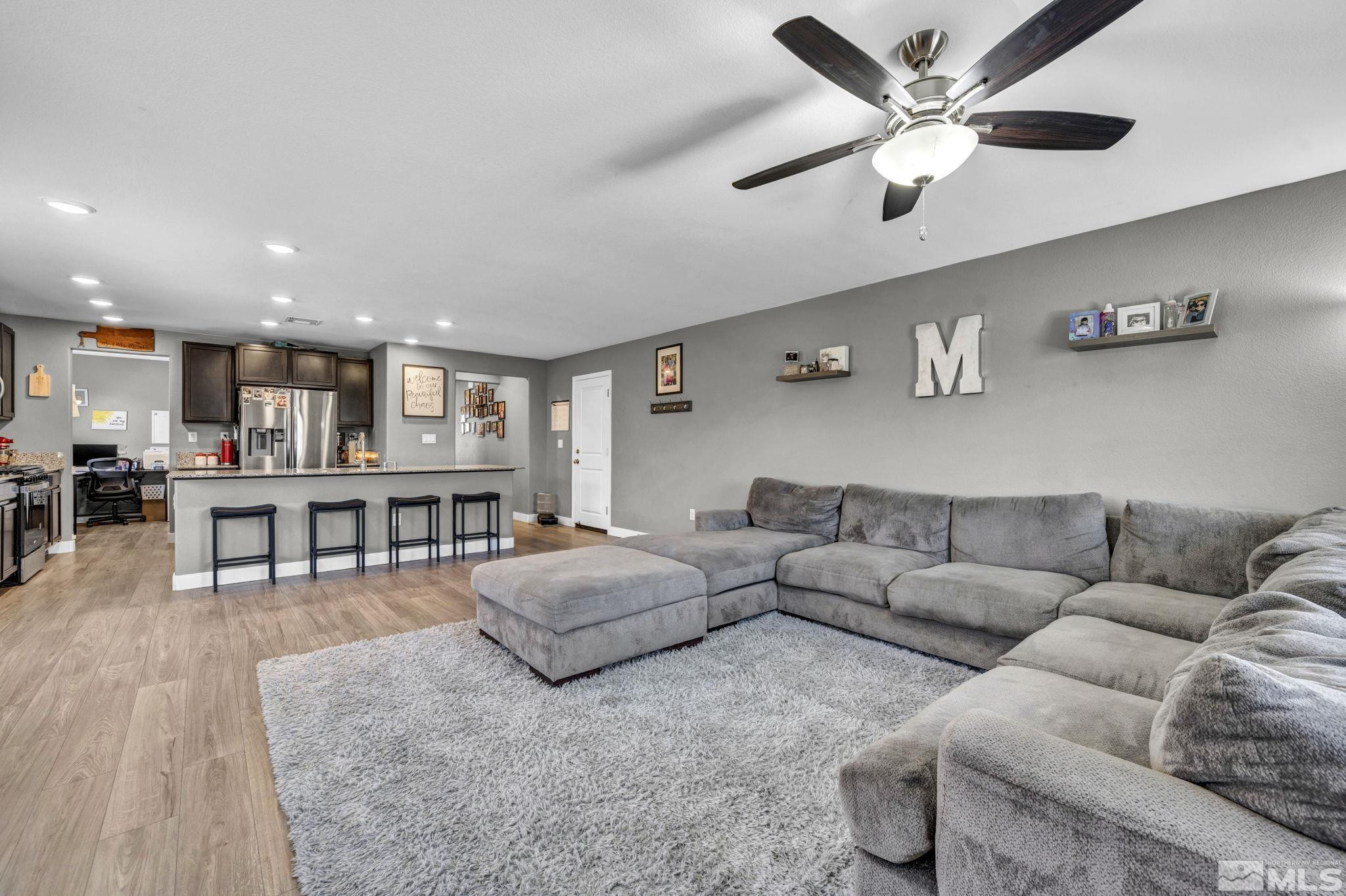 623 Yerington Drive Reno, NV 89506 - Photo 7 of 40 a living room with furniture and kitchen view