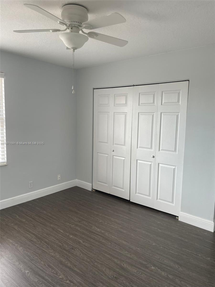 2145 Southwest 150th Avenue Miramar, FL 33027 - Photo 30 of 36 a view of an empty room with wooden floor