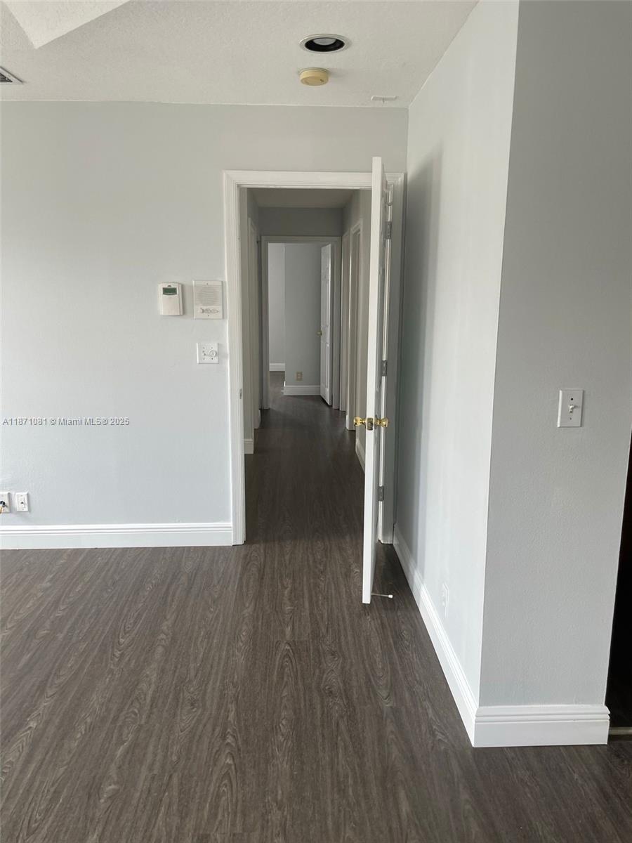 2145 Southwest 150th Avenue Miramar, FL 33027 - Photo 31 of 36 a view of a room with wooden floor