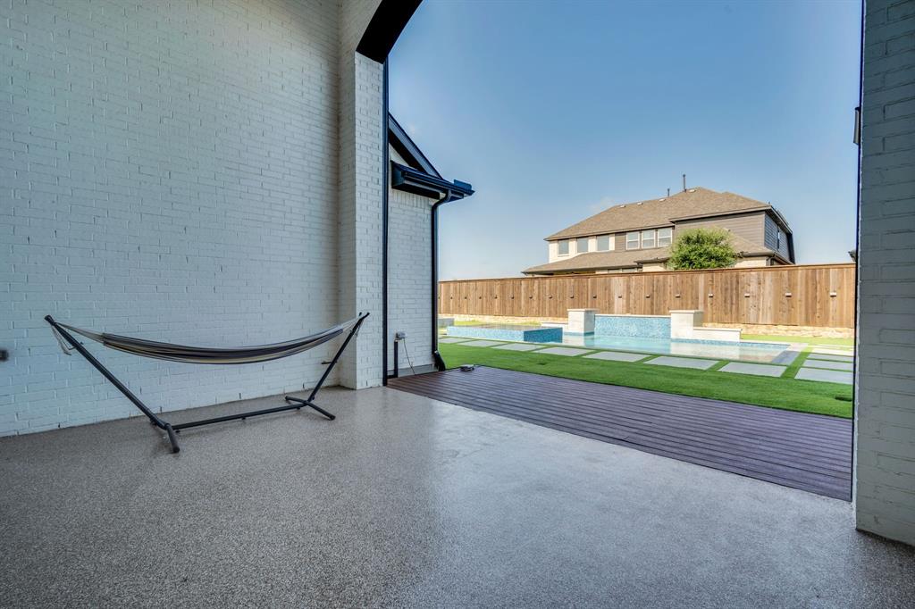 1516 M3 Ranch Road Mansfield, TX 76063 - Photo 34 of 40 You have an extended patio with a electric shade to enjoy your beautiful view!