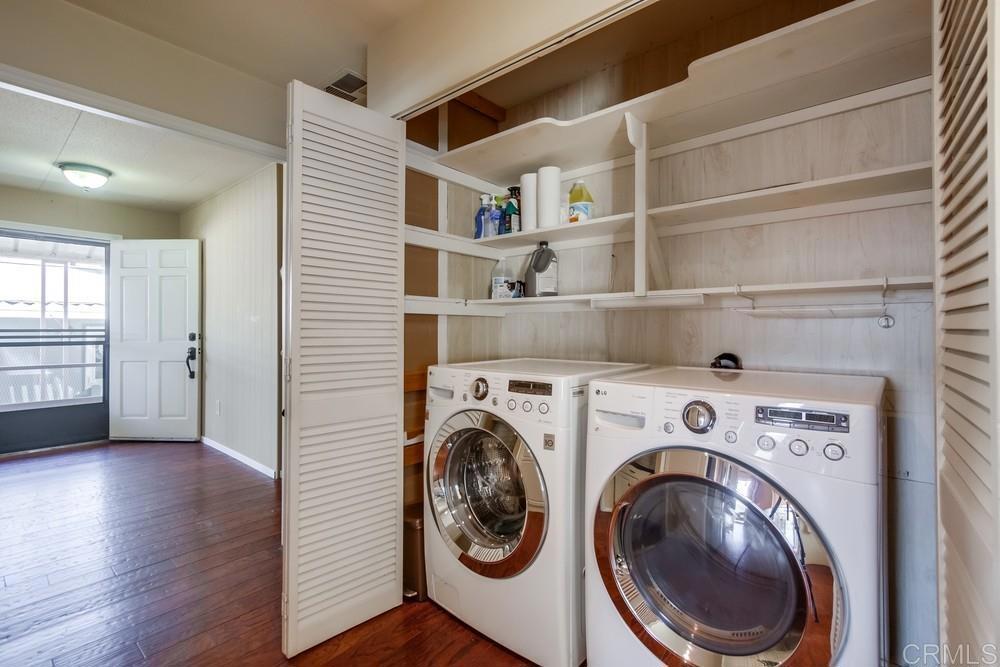 4993 Old Cliffs Road San Diego, CA 92120 - Photo 18 of 20 a view of washer and dryer in a kitchen