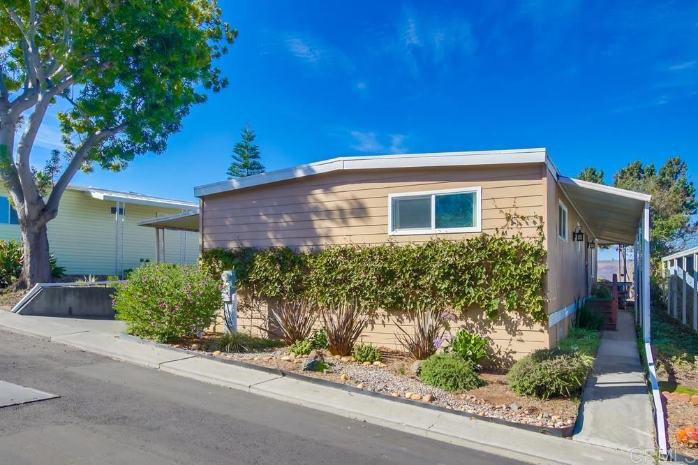 4993 Old Cliffs Road San Diego, CA 92120 - Photo 2 of 20 front view of a house
