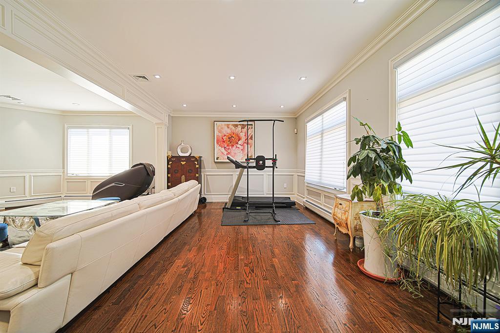897 Virgil Avenue Ridgefield, NJ 07657 - Photo 14 of 50 a living room with furniture and a large window